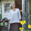 Blus med fransärm