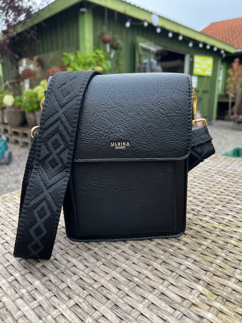 Väska, läderlook, med mönstrat band ulrika