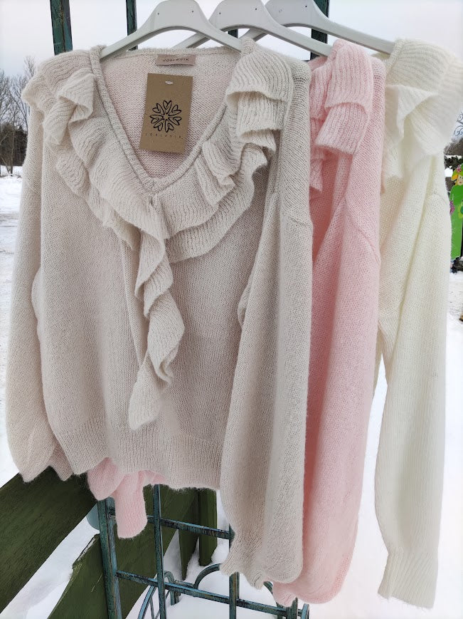 Stickad tröja med volang, Jörlevik