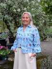Blus med blombroderi, Ackleja