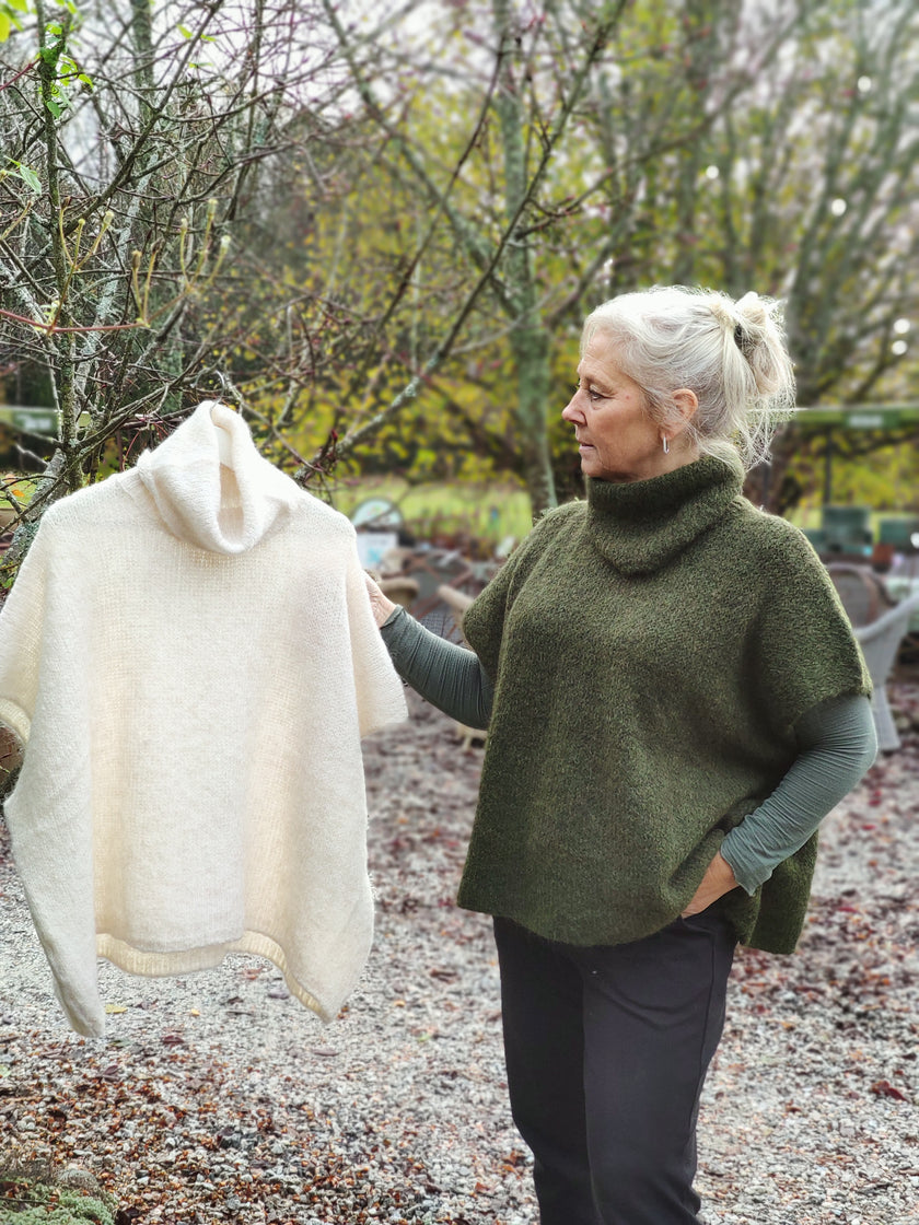 Väst med polokrage, Minou