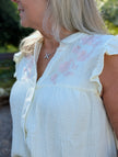 Blus med broderade blommor, Qnuz