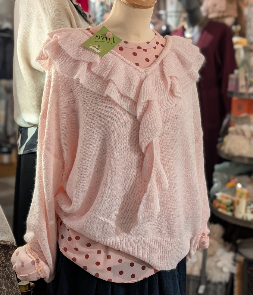 Stickad tröja med volang, Jörlevik