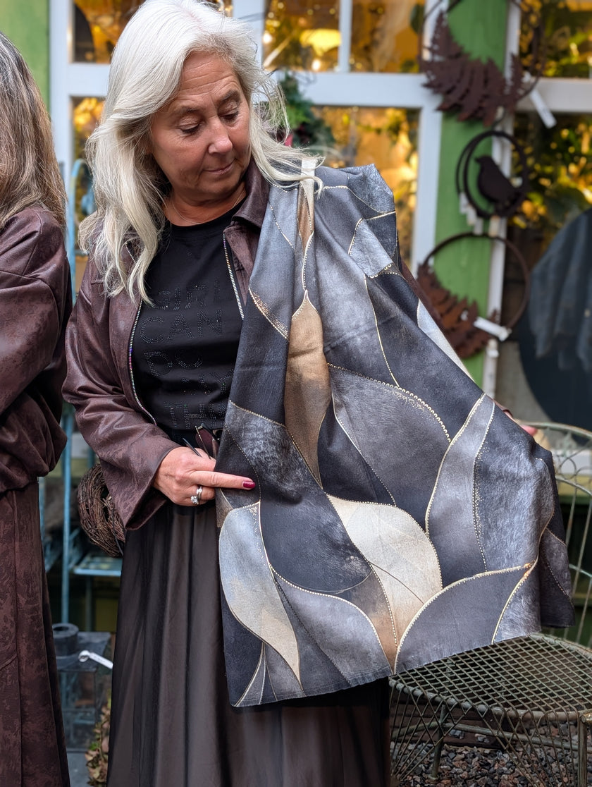 Halsduk mönster med guld-skimmer