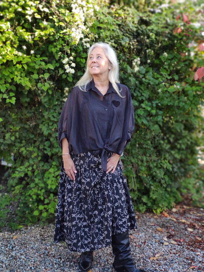 Blus, ponchoblus, Minou